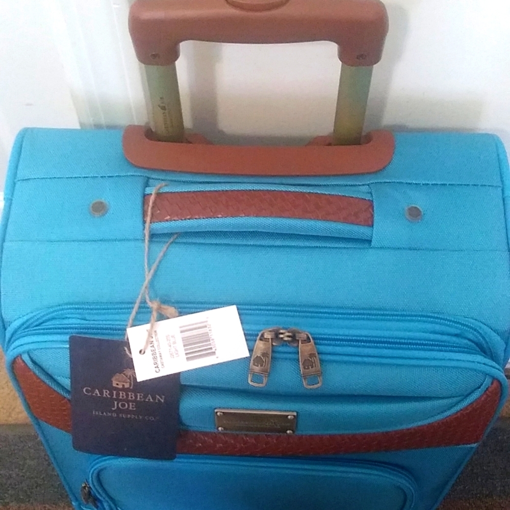 Softside, 20 Inch 8 Wheel Spinner Carry-On, Light Blue. - Picture 5 of 14
